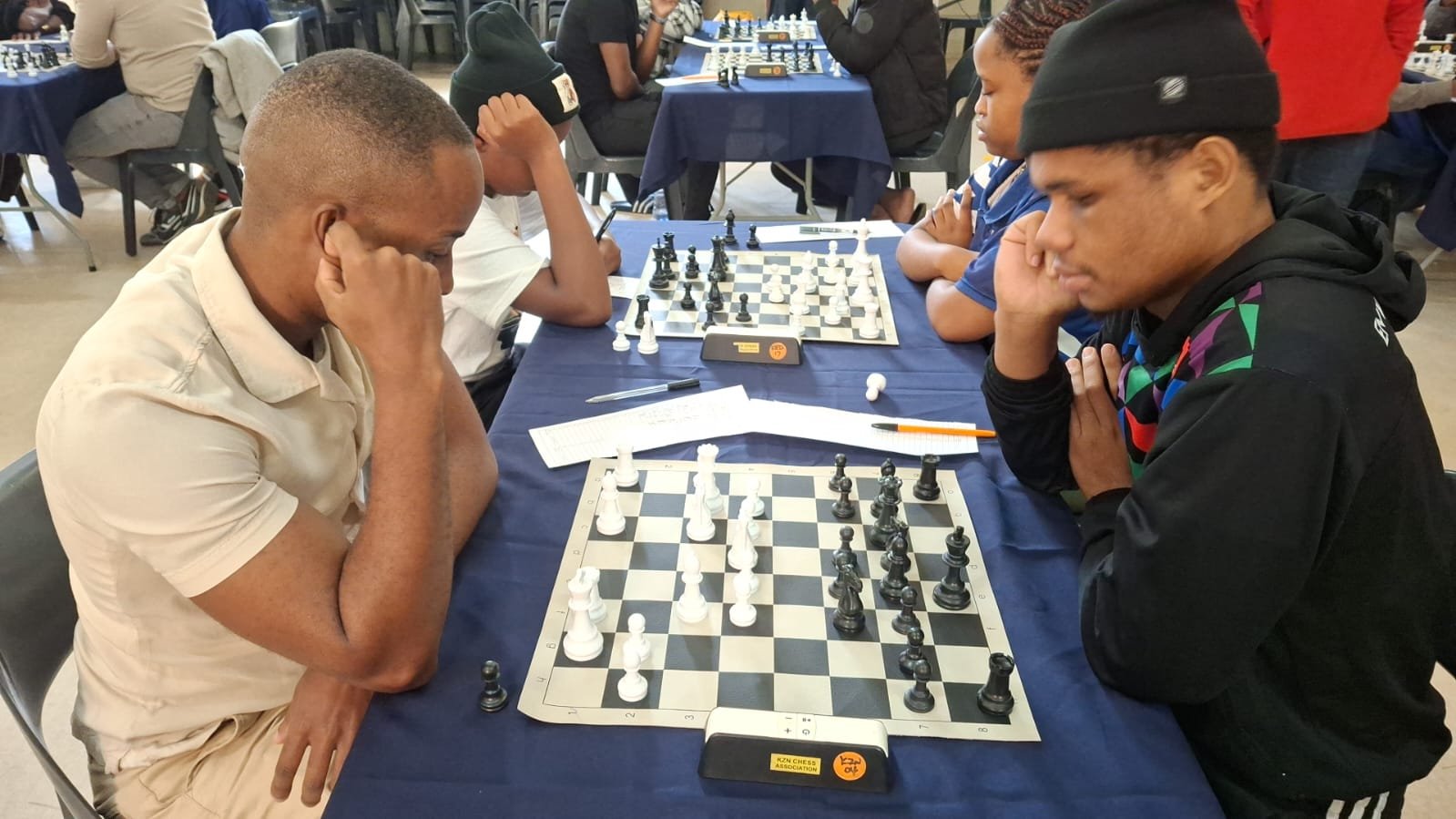 Two players studying a position during tournament play